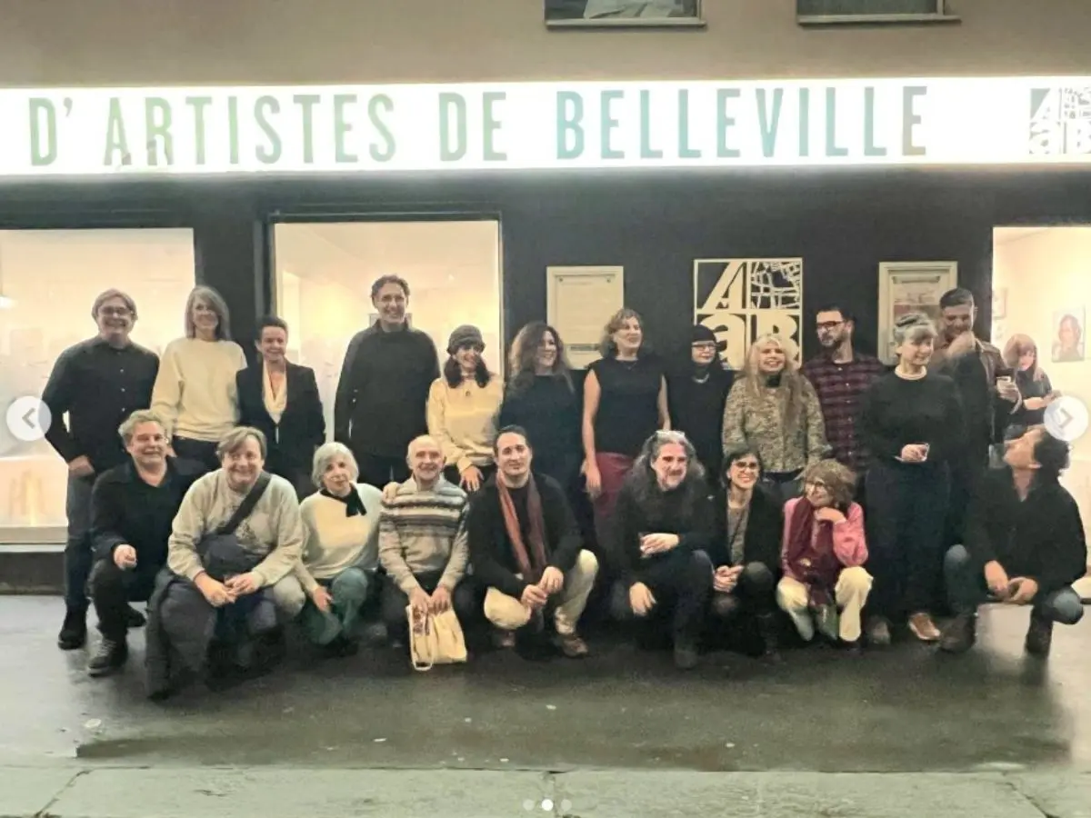Artists from Paris, Cádiz, and Guiri strike a pose on the evening of the opening at the Paris exhibition at the Galerie des Ateliers d'Artistes in Belleville
